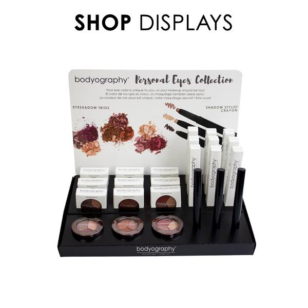 Acrylic cosmetics display for mascara and eye compact